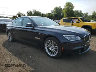 2015 BMW 7 Series 750i xDrive with VIN WBAYB6C53FD966042, listed as a Copart auction lot 69387464 with 64,977 mi miles and Salvage Title. Bid and sale history available at carsss.com. Image 4.