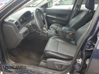 2009 Jeep Grand Cherokee Laredo with VIN 1J8HR48P49C545334, listed as a Copart auction lot 71562344 with 183,976 mi miles and Salvage Title. Bid and sale history available at carsss.com. Image 7.