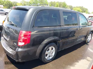 2012 Dodge Grand Caravan SXT with VIN 2C4RDGCG8CR247824, listed as a IAAI auction lot 42210397 with 200,919 mi miles and . Bid and sale history available at DreamBid. Image 4.