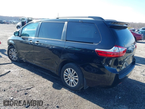 2016 Toyota Sienna XLE with VIN 5TDYK3DC3GS697173, listed as a IAAI auction lot 40899585 with 121,693 mi miles. Bid and sale history available at carsss.com. Image 3.