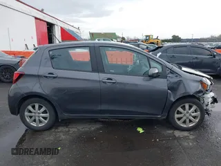 2015 Toyota Yaris L with VIN VNKKTUD38FA043393, listed as a IAAI auction lot 41573010 with 107,146 mi miles and . Bid and sale history available at DreamBid. Image 14.