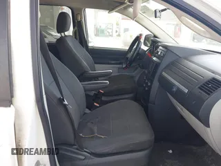 2008 Dodge Grand Caravan SE with VIN 1D8HN44H98B126418, listed as a IAAI auction lot 42223290 with 317,457 mi miles and . Bid and sale history available at DreamBid. Image 5.