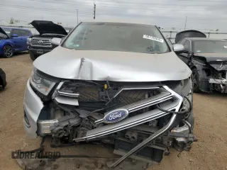2015 Ford Edge Titanium z VIN 2FMTK4K9XFBB56155, wystawiony jako Copart lot #56735555 z przebiegiem 86 167 mil mil oraz Szkoda całkowita • Salvage title. Historia ofert i sprzedaży dostępna na DreamBid. Obrazek 5.