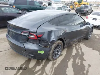 2018 Tesla Model 3 Long Range Battery with VIN 5YJ3E1EA0JF101564, listed as a IAAI auction lot 41902214 with 101,581 mi miles. Bid and sale history available at carsss.com. Image 4.