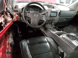 2005 Nissan Titan SE z VIN 1N6AA06BX5N502595, wystawiony jako Copart lot #85888184 z przebiegiem 231 851 mil mil oraz Nie do naprawy • Non repairable. Historia ofert i sprzedaży dostępna na DreamBid. Obrazek 8.