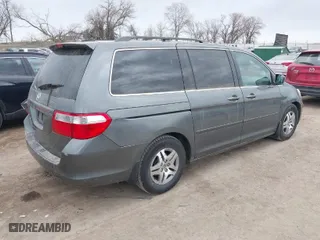 2007 Honda Odyssey EX-L with VIN 5FNRL386X7B423012, listed as a IAAI auction lot 41876854 with 266,588 mi miles. Bid and sale history available at carsss.com. Image 4.
