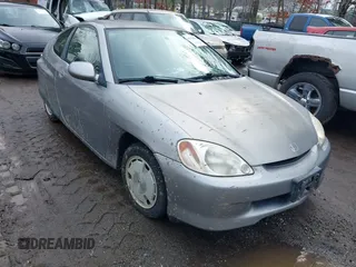 2001 Honda Insight z VIN JHMZE14711T003249, wystawiony jako IAAI lot #41526548 z przebiegiem 123 871 mil mil oraz . Historia ofert i sprzedaży dostępna na DreamBid. Obrazek 1.