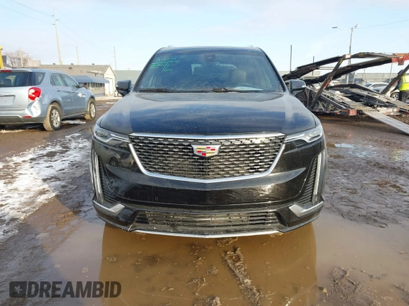 2025 Cadillac XT6 FWD Premium Luxury with VIN 1GYKPCRS6SZ104902, listed as a IAAI auction lot 41565224 with 4,735 mi miles and . Bid and sale history available at DreamBid. Image 12.