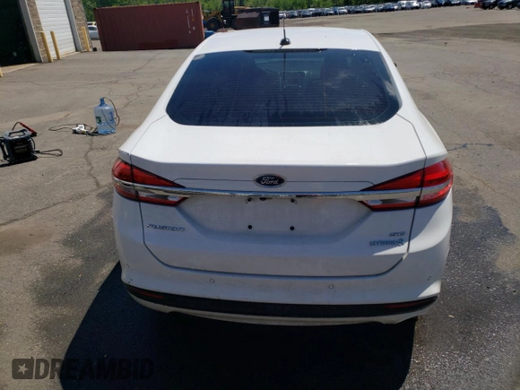 2017 Ford Fusion Hybrid SE with VIN 3FA6P0LU2HR326162, listed as a Copart auction lot 57495005 with 135,797 mi miles and Clean title. Bid and sale history available at DreamBid. Image 6.