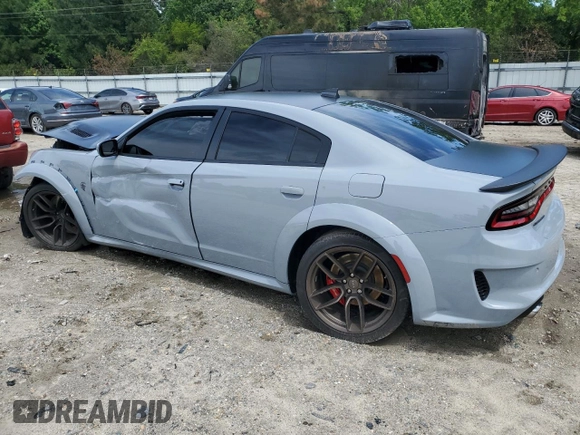 2021 Dodge Charger SRT Hellcat Widebody z VIN 2C3CDXL97MH603070, wystawiony jako Copart lot #57661925 z przebiegiem Nie podano mil oraz Szkoda całkowita • Salvage title. Historia ofert i sprzedaży dostępna na DreamBid. Obrazek 2.
