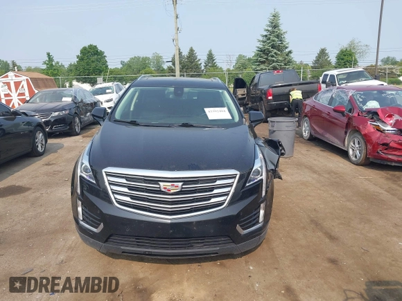 2018 Cadillac XT5 Luxury AWD with VIN 1GYKNDRSXJZ247863, listed as a IAAI auction lot 42392404 with 96,629 mi miles and . Bid and sale history available at DreamBid. Image 12.