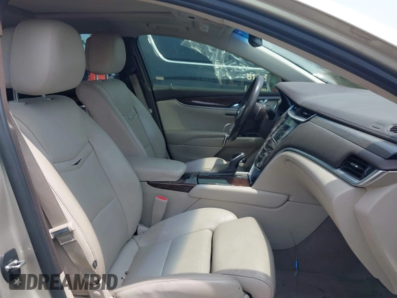 2014 Cadillac XTS Luxury z VIN 2G61M5S38E9291182, wystawiony jako IAAI lot #42495838 z przebiegiem 104 941 mil mil oraz . Historia ofert i sprzedaży dostępna na DreamBid. Obrazek 5.