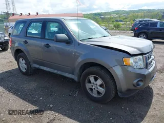 2009 Ford Escape XLS with VIN 1FMCU02709KC11692, listed as a IAAI auction lot 42202890 with 155,243 mi miles and . Bid and sale history available at DreamBid. Image 1.