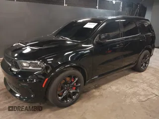 2023 Dodge Durango R/T Plus with VIN 1C4SDJCT8PC571642, listed as a IAAI auction lot 42093743 with 33,631 mi miles and . Bid and sale history available at DreamBid. Image 18.
