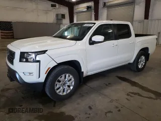 2023 Nissan Frontier SV z VIN 1N6ED1EK7PN667863, wystawiony jako Copart lot #55830975 z przebiegiem 22 809 mil mil oraz Szkoda całkowita • Salvage title. Historia ofert i sprzedaży dostępna na DreamBid. Obrazek 1.