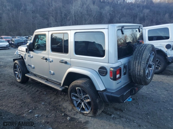 2024 Jeep Wrangler 4xe Willys with VIN 1C4RJXN69RW282529, listed as a Copart auction lot 48499615 with 2,164 mi miles and Salvage Title. Bid and sale history available at carsss.com. Image 2.