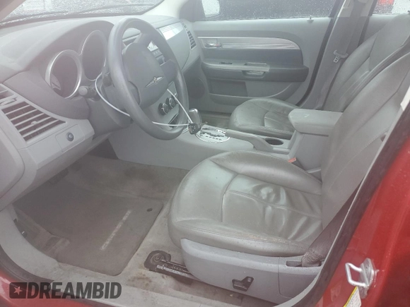 2007 Chrysler Sebring Touring with VIN 1C3LC56R17N528560, listed as a Copart auction lot 50024615 with 143,276 mi miles and Salvage Title. Bid and sale history available at DreamBid. Image 7.