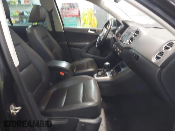 2016 Volkswagen Tiguan S with VIN WVGBV7AX9GW569978, listed as a IAAI auction lot 41531258 with 106,773 mi miles and . Bid and sale history available at DreamBid. Image 5.