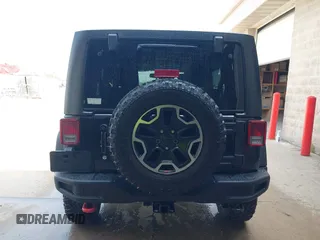 2015 Jeep Wrangler Unlimited Rubicon Hard Rock с VIN 1C4HJWFG0FL550247, выставлен на аукционе IAAI как лот 42474614 с пробегом 93 084 миль миль и . История ставок и продаж доступна на DreamBid. Изображение 16.