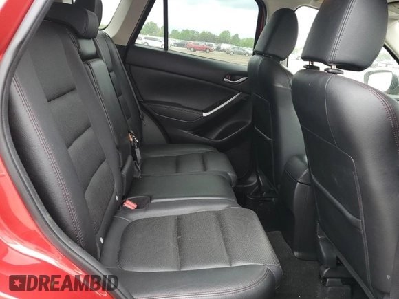 2016 Mazda CX-5 Grand Touring with VIN JM3KE4DY0G0664379, listed as a Copart auction lot 54659005 with 116,022 mi miles and Salvage Title. Bid and sale history available at DreamBid. Image 11.