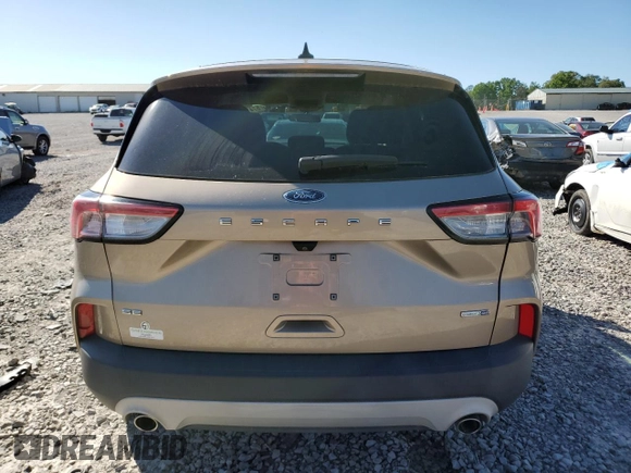 2020 Ford Escape SE z VIN 1FMCU9G69LUB63156, wystawiony jako Copart lot #57412545 z przebiegiem 82 230 mil mil oraz Czysty tytuł • Clean title. Historia ofert i sprzedaży dostępna na DreamBid. Obrazek 6.
