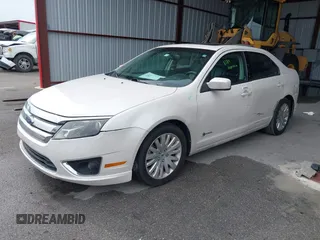 2010 Ford Fusion Hybrid with VIN 3FADP0L35AR182062, listed as a IAAI auction lot 42399945 with 101,565 mi miles and . Bid and sale history available at DreamBid. Image 2.