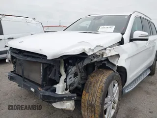 2014 Mercedes-Benz GL 450 z VIN 4JGDF7CE5EA390994, wystawiony jako IAAI lot #41618791 z przebiegiem 130 492 mil mil oraz . Historia ofert i sprzedaży dostępna na DreamBid. Obrazek 6.