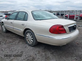 1999 Lincoln Continental with VIN 1LNHM97V1XY691852, listed as a IAAI auction lot 41820994 with 98,858 mi miles and . Bid and sale history available at DreamBid. Image 3.