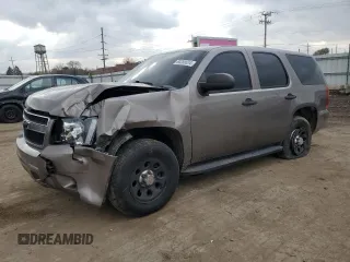 2012 Chevrolet Tahoe Commercial with VIN 1GNSK2E07CR324903, listed as a Copart auction lot 80266624 with 131,700 mi miles and Salvage title. Bid and sale history available at DreamBid. Image 1.
