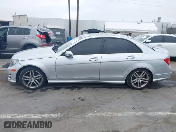 2014 Mercedes-Benz C 250 Sport with VIN WDDGF4HB8EA966999, listed as a IAAI auction lot 42452823 with 143,339 mi miles and . Bid and sale history available at DreamBid. Image 15.