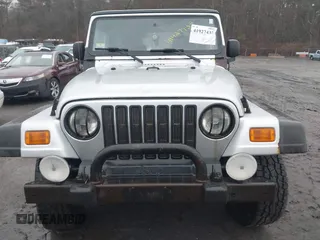 2006 Jeep Wrangler X with VIN 1J4FA39SX6P709588, listed as a IAAI auction lot 41927435 with 227,990 mi miles. Bid and sale history available at carsss.com. Image 12.