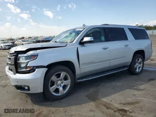 2020 Chevrolet Suburban Premier with VIN 1GNSCJKC0LR216855, listed as a Copart auction lot 72287114 with 94,642 mi miles and Salvage Title. Bid and sale history available at carsss.com. Image 1.