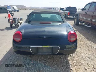 2002 Ford Thunderbird w/Hardtop Premium with VIN 1FAHP60A72Y129115, listed as a IAAI auction lot 41768100 with 54,393 mi miles. Bid and sale history available at carsss.com. Image 16.