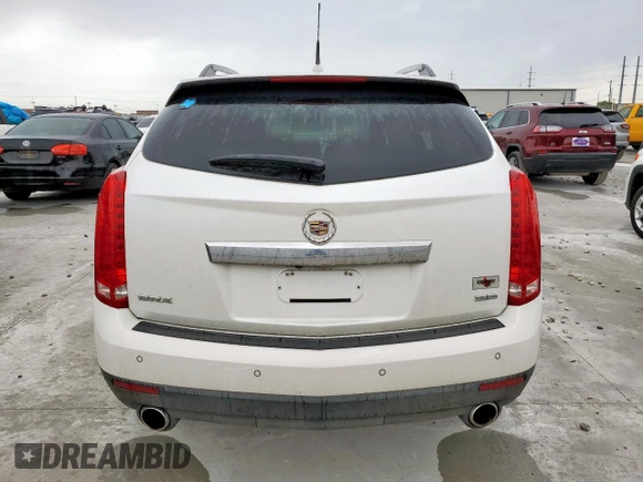 2012 Cadillac SRX Luxury Collection z VIN 3GYFNAE35CS642113, wystawiony jako Copart lot #60201195 z przebiegiem 108 006 mil mil oraz Szkoda całkowita • Salvage title. Historia ofert i sprzedaży dostępna na DreamBid. Obrazek 6.