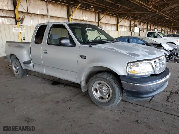 2003 Ford F-150 XL with VIN 1FTRX07233KD43811, listed as a Copart auction lot 85113414 with 215,390 mi miles and Salvage Title. Bid and sale history available at carsss.com. Image 4.