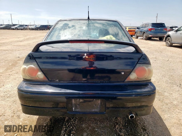 2002 Mitsubishi Lancer OZ-Rally z VIN JA3AJ86E32U001737, wystawiony jako Copart lot #59275695 z przebiegiem 177 332 mil mil oraz Szkoda całkowita • Salvage title. Historia ofert i sprzedaży dostępna na DreamBid. Obrazek 6.