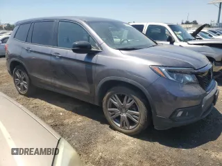 2021 Honda Passport EX-L with VIN 5FNYF7H5XMB013999, listed as a Copart auction lot 61893804 with 52,859 mi miles and Salvage Title. Bid and sale history available at carsss.com. Image 4.