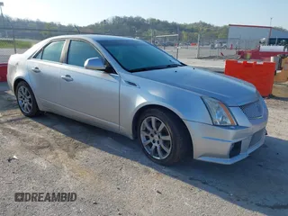 2009 Cadillac CTS RWD with VIN 1G6DV57V590125951, listed as a IAAI auction lot 42005788 with 160,133 mi miles and . Bid and sale history available at carsss.com. Image 1.