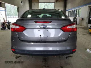 2013 Ford Focus SE with VIN 1FADP3F20DL250081, listed as a Copart auction lot 62140995 with 78,118 mi miles and Salvage title. Bid and sale history available at DreamBid. Image 6.