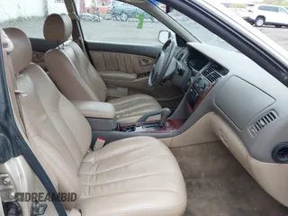 2000 Mitsubishi Diamante LS z VIN 6MMAP67P7YT005234, wystawiony jako IAAI lot #41896098 z przebiegiem 131 852 mil mil oraz . Historia ofert i sprzedaży dostępna na DreamBid. Obrazek 5.