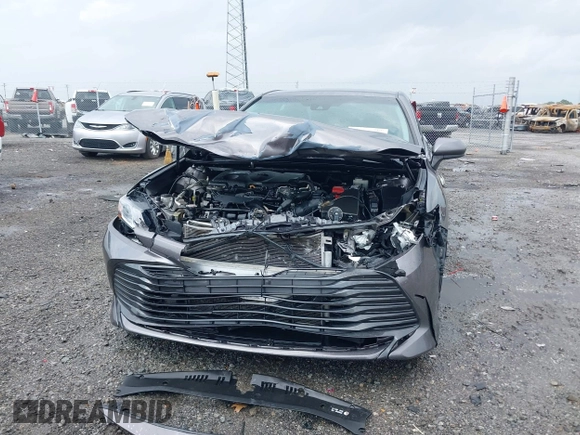 2020 Toyota Camry LE with VIN 4T1C11AK1LU328682, listed as a IAAI auction lot 41966816 with 172,334 mi miles and . Bid and sale history available at DreamBid. Image 12.