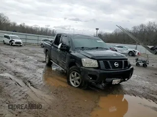 2011 Nissan Titan Pro-4X z VIN 1N6BA0EC2BN325891, wystawiony jako Copart lot #43241505 z przebiegiem Nie podano mil oraz Szkoda całkowita • Salvage title. Historia ofert i sprzedaży dostępna na DreamBid. Obrazek 10.