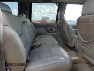 1999 Chevrolet Suburban with VIN 3GNEC16R7XG141671, listed as a Copart auction lot 77784174 with 207,234 mi miles and Salvage Title. Bid and sale history available at carsss.com. Image 11.
