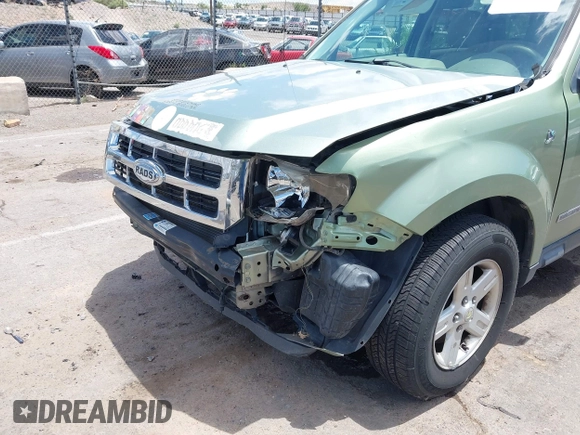 2008 Ford Escape Hybrid z VIN 1FMCU59HX8KB98122, wystawiony jako IAAI lot #42650207 z przebiegiem 138 757 mil mil oraz . Historia ofert i sprzedaży dostępna na DreamBid. Obrazek 6.