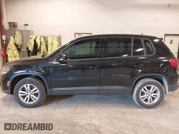 2014 Volkswagen Tiguan SE z VIN WVGAV3AX9EW614094, wystawiony jako IAAI lot #42350601 z przebiegiem 128 996 mil mil oraz . Historia ofert i sprzedaży dostępna na DreamBid. Obrazek 15.