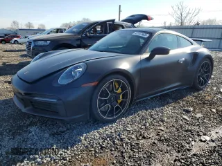 2021 Porsche 911 Turbo S with VIN WP0AD2A94MS258095, listed as a Copart auction lot 43157565 with 1,513 mi miles and Salvage Title. Bid and sale history available at carsss.com. Image 1.