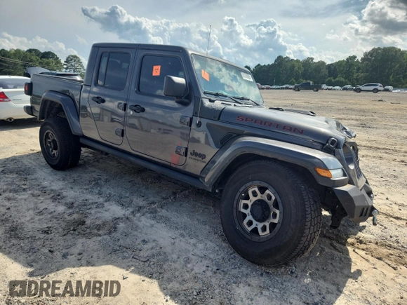 2021 Jeep Gladiator 80th Anniversary с VIN 1C6HJTAG7ML521094, выставлен на аукционе Copart как лот 61276595 с пробегом 68 684 миль миль и Списание • Salvage title. История ставок и продаж доступна на DreamBid. Изображение 4.