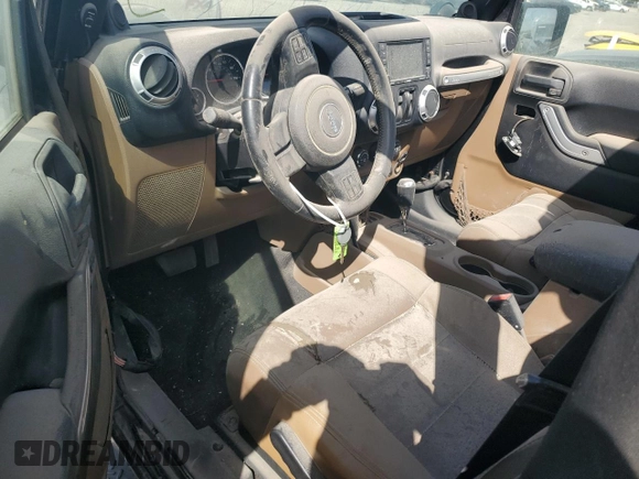 2012 Jeep Wrangler Sahara z VIN 1C4AJWBG1CL216425, wystawiony jako Copart lot #48377825 z przebiegiem 99 649 mil mil oraz Szkoda całkowita • Salvage title. Historia ofert i sprzedaży dostępna na DreamBid. Obrazek 8.