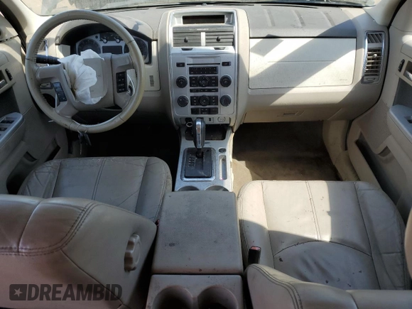 2010 Mercury Mariner Premier с VIN 4M2CN9H78AKJ26918, выставлен на аукционе Copart как лот 56000095 с пробегом 195 357 миль миль и Списание • Salvage title. История ставок и продаж доступна на DreamBid. Изображение 8.