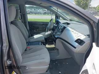 2014 Toyota Sienna LE AAS with VIN 5TDKK3DC3ES435091, listed as a IAAI auction lot 42735534 with 150,132 mi miles and . Bid and sale history available at DreamBid. Image 5.